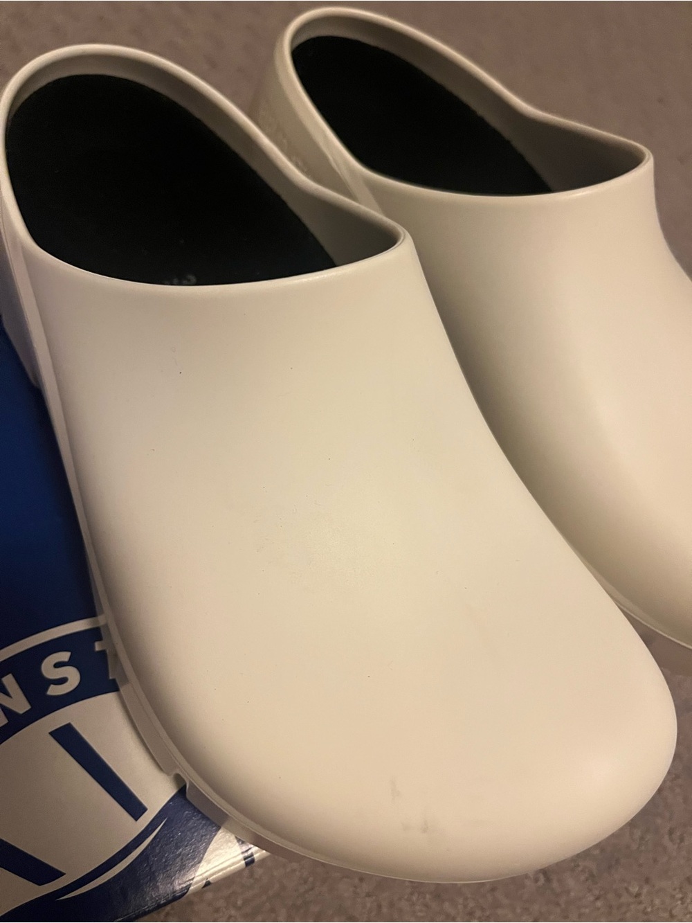 Birkenstock White Slip-On Clogs with Black Footbed 38